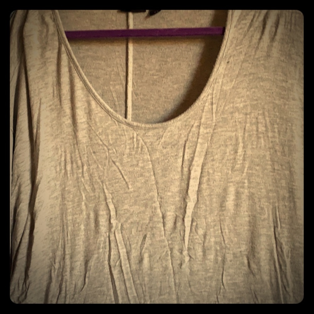A gray flurries shirt with white lace